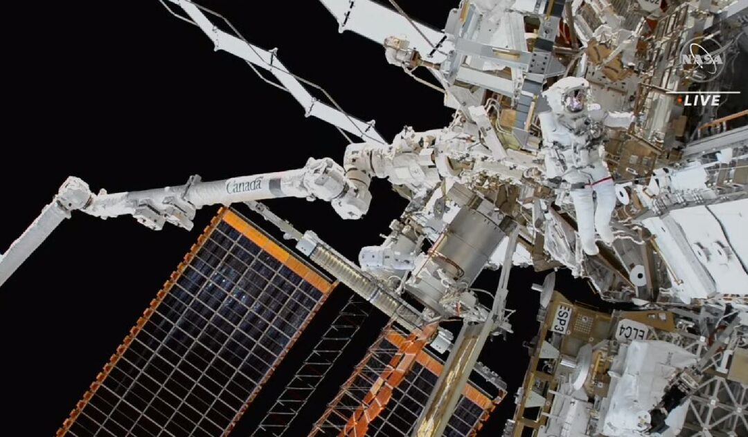 NASA astronauts on spacewalk complete installation of iROSA number six